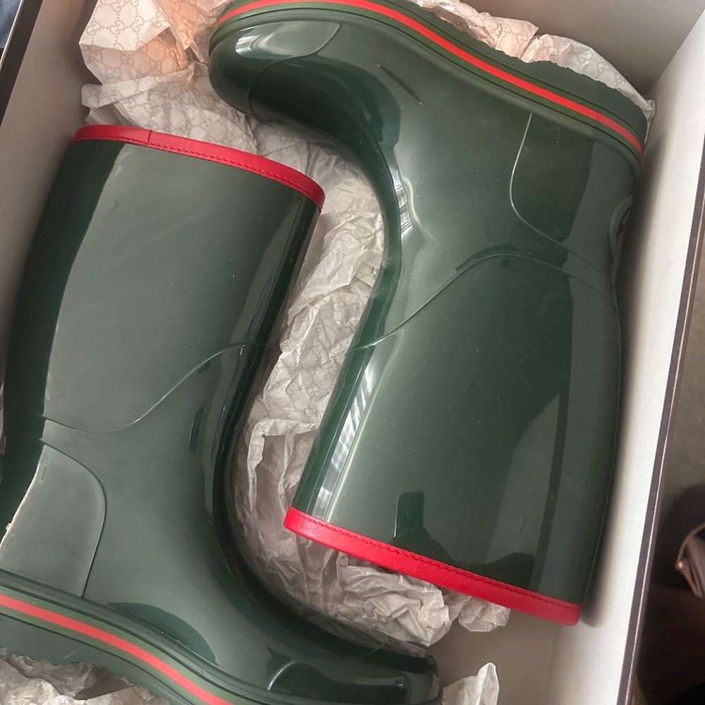 Gucci rain boots never worn! Been in back of closet collecting dust!